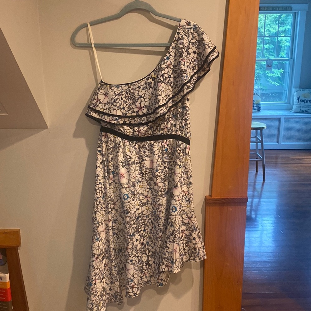 Likely dress never worn, floral design